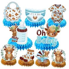 baby shower decorations with animals and giraffes on it's own body