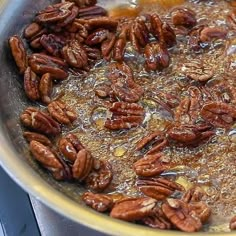 there are many pecans cooking in the pot