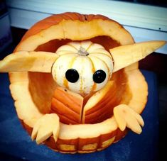 a pumpkin carved to look like an owl