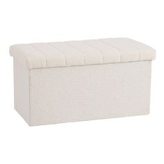 an upholstered white storage box on a white background