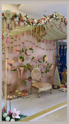 a room decorated in pink, gold and white