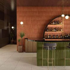 an empty bar with stools and bottles on the shelves