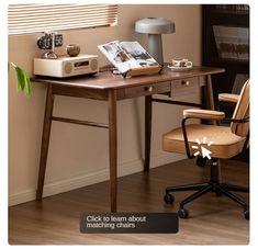 an office chair sitting next to a desk with a book on it and a lamp in the corner