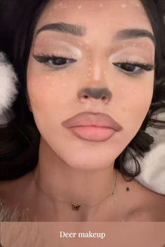 A simple deer-makeup look consists of white dots over the forehead, nose, cheekbones, and neck as well as black on the nose and upper lip. You'll also need white eyeshadow or powder around the eyes.#deermakeup #animalmakeup #halloweenmakeup #cosplaymakeup #forestcreature #wildbeauty #antlersandlashes #fawndorable #makeupinspo #natureinspired Black Dots On Nose, Doe Makeup, Exotic Hairstyles, Nose Makeup, Skeleton Makeup, Cake Face, Mini Twists