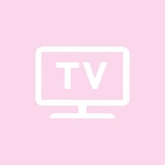 a flat screen tv sitting on top of a pink wall