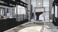 a large walk in closet filled with lots of clothes and furniture next to a mirror