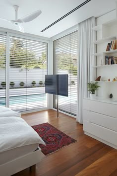 the bedroom is clean and ready to be used as an office or living room area