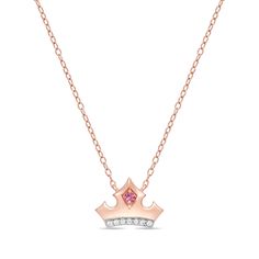 Your beloved will love the luxe and dainty look of this tiara necklace inspired by Aurora. This piece of jewelry is part of the Enchanted Disney Fine Jewelry Collection and showcases a necklace in the form of Sleeping Beauty's iconic crown. The necklace is crafted in 10k rose gold and features a band lined with 1/20 CTTW of sparkling diamonds and a centerpiece of bright pink topaz on a diamond bezel frame. Sleeping Beauty Necklace, Aurora Tiara, Disney Princess Jewelry, Aurora Necklace, Tiara Diamond, Disney Aurora, Tiara Necklace, Enchanted Disney, Enchanted Disney Fine Jewelry