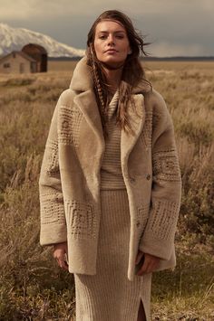 Bundle up and brave the winter in our reversible Freya coat, an oversized beauty with unique woven accents throughout. Made from wonderfully soft, naturally insulating full-grain Spanish Merino lamb shearling, this open-collar coat lends cozy vibes to cold days and offers two distinct styles in one durable design. Worn either way, you'll be the picture of contemporary craftsmanship, thanks to thin leather lacing woven in squares with shearling accents—and you'll be warm to boot. With roll-back c Wool Coats, Mode Boho, Sheepskin Coat, Collared Coat, Shearling Coat, Women's Coats, Coat Fashion, Leather Coat, Leather And Lace