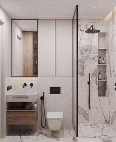 a bathroom with white marble walls and flooring