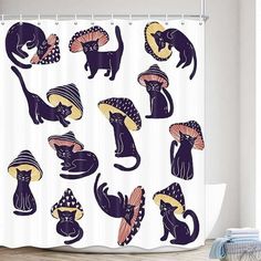 a shower curtain with black cats and hats on it