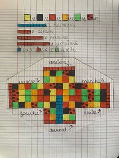 a piece of paper that has been made to look like a cross with different colors