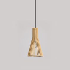 a wooden light fixture hanging from a ceiling