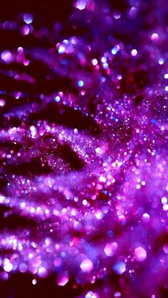 an abstract purple background with lots of small bubbles