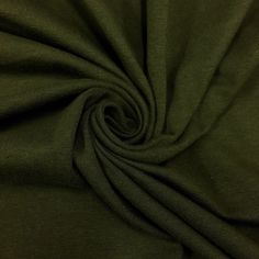 a close up view of a green fabric