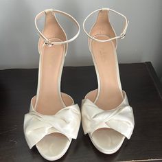 Wore These Beauties For Less Than An Hour At My Destination Wedding October 21’ And They Were Incredibly Comfy And Complimented My Wedding Gown Beautifully Originally Purchased For $198.00 And Still Selling On Neiman Marcus And Kate Spade Online Still Have Original Box And Cloth Bag To Transport Them And Keep Them Beautiful And Spot Free Satin Lining: 100% Kid Leather 4" Platform Heel Buckle Closure At Ankle Strap Imported Style No. K0006 Cream Fitted Wedding Shoes With Heel Strap, Fitted Cream Wedding Shoes With Heel Strap, Classic Wedding Heels With Heel Strap, Kate Spade White Open Toe Heels, Classic White Ankle Strap Wedding Shoes, Classic Cream Heels For Wedding, Classic Open Toe Wedding Heels, Classic Cream Wedding Heels, Kate Spade White Round Toe Heels