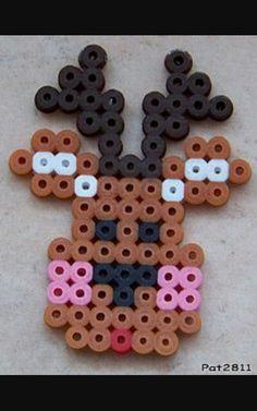 a beaded animal made out of brown and pink beads