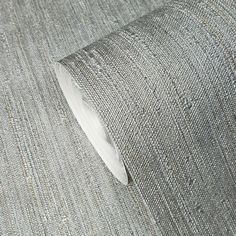 a close up view of a grey fabric