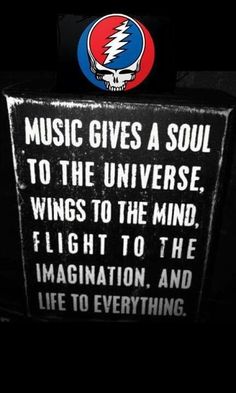 a sign that says music gives a soul to the universe, wings to the mind, flight to the imagination, and life to everything