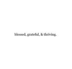 the words are written in black and white on a white background, which reads, blessed, grateful, & thriving