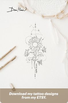 an image of a sunflower tattoo design on a sheet of paper with crayons next to it