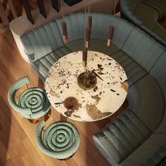 an overhead view of a table and chairs in a living room