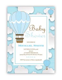 a baby shower with hot air balloons in the sky