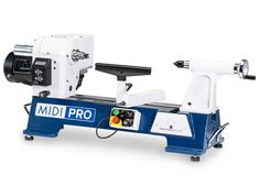 a machine that is sitting on top of a blue and white stand with the words mid pro