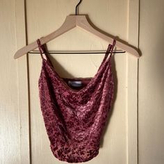 This Velvet Cami Is So Freaking Cute! I Wish It Looked Good On Me, But Cowl Necks Are Not My Thing. The Velvet On The Outside Has A Very Soft Touch To It. The Straps Are Adjustable, And The Fit Is A Bit Cropped. Brand: Urban Outfitters Size: Xs Color: Mauve Fabric: 60% Polyester 30% Nylon 10% Spandex Condition: Never Worn, In Excellent Condition, No Damage This Item Comes From A Household With Cats. Please Proceed With Caution If You Have Severe Allergies. Fitted Pink Crop Top From Urban Outfitters, Fitted Pink Crop Top By Urban Outfitters, Purple Cami Top For Party, Urban Outfitters Fitted Tank Top For Night Out, Fitted Urban Outfitters Tank Top For Night Out, Urban Outfitters Purple Sleeveless Top, Fitted Camisole Tops By Urban Outfitters, Urban Outfitters Sleeveless Tank Top For Party, Urban Outfitters Fitted Camisole Top