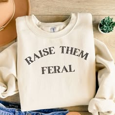 Embrace the wild side with Raise Them Feral Comfort Colors Sweatshirt. Rustic simplicity meets style, printed on high-quality 100% Ringspun cotton tees for ultimate comfort. Unleash your inner feral and make a statement with this unique shirt. #RaiseThemFeral High Quality 100% Ring Spun Cotton Pre-Shrunken Fabric Relaxed Fit Crew Neck Embroidered Chicken, Tired Girl, Chicken Sweater, Chicken Lover Gifts, School Clothes, Vinyl Shirts, Outfit Trends, Valentine's Gift, Women Outfits