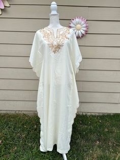 "Lightweight vintage cream-colored kaftan, handmade with gold embroidered stitching. Zip Closure, slightly sheer. Garment Measurements:  Estimated: Medium  (Loose fit on Small/Medium) 51\" Shoulder to Hem 18\" Across Waist Flat *items may come with minor flaws due to pre-loved wear. we are advocates of buying used and hope you can appreciate this garment and its character. items are pre-hand-washed/de-pilled/mended if needed and any major flaws will try to be noted. Please message for additional measurements if needed. xo Lauren" Embroidery Neckline, Dress With Embroidery, Kaftan Dress, Double Breasted Blazer, Vintage Lighting, Dress Clothes For Women, Cream Color, Dress Outfits, Loose Fitting