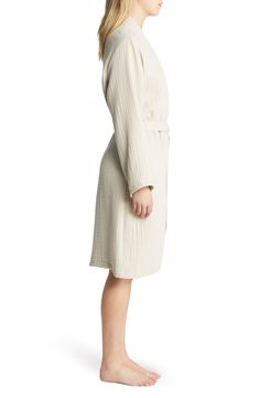 Enjoy the luxurious elegance of a spa-inspired robe at home with this supercomfy style made from four-ply gauze woven from long-staple Turkish cotton. It's also garment washed for added lived-in softness from the first wear. 42" length ( size X-Large)   Open front   V-neck   Long sleeves   Side-seam pockets   Removable tie belt   100% cotton   Machine wash, tumble dry   Made in Turkey   OEKO-TEX®–certified materials free of harmful substances Chic Long Robe For Loungewear, Chic Long Loungewear Robe, Cozy Relaxed-fit Robe For Daywear, Relaxed Fit Beige Robe For Loungewear, Beige Relaxed Fit Robe For Loungewear, Beige Spring Loungewear Robe, Beige Robe For Spring Loungewear, Spring Cream Robe For Loungewear, Cream Long Sleeve Kimono For Loungewear