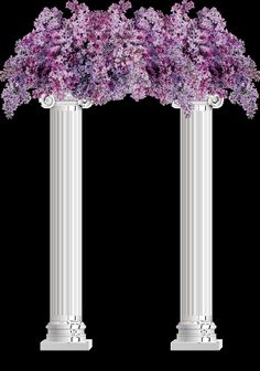 three white pillars with purple flowers on them