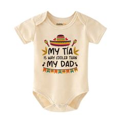 Get ready to laugh with our Funny Tia Baby bodysuit! Keep your little one cooler than their dad in this hilarious, yet stylish shirt. A perfect gift for any cool aunt, this bodysuit is sure to bring humor to your baby's wardrobe. Get yours today! Keywords : Funny Tia(Aunt) Baby bodysuit, Cooler than my Dad shirt, Cool Aunt Baby clothes, Baby humor, Funny Baby gifts, Baby apparel, Baby clothing, Baby fashion, Baby attire, Cute baby outfit, Baby shower gift, Humorous baby clothes, Aunt-themed baby bodysuit, Parenting, Baby humor, Funny baby outfit, Baby gift, Cool aunt baby apparel, Baby fashion, Auntie humor, Funny baby bodysuit, Cool auntie baby clothes, Baby humor, Auntie-themed baby wear Newborn Baby bodysuit, baby shower, Newborn Clothes, Pregnancy announcement, baby announcement, gift Auntie Baby Clothes, Aunt Baby Clothes, Baby Humor, Aunt Baby, Auntie Baby, Baby Aunt, Funny Baby Gifts, Ivf Baby, Cool Aunt