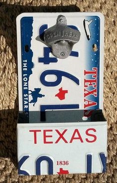 an old license plate with the word texas on it