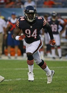 a football player is running on the field