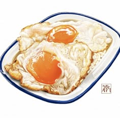 two fried eggs are on top of bread in a blue and white dish with an egg yolk