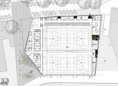 an aerial view of a basketball court with several courts in the center and two pavilions on each side