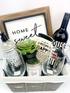 Storage Basket Square Wood Wall Decor “Home Sweet Home” Candle (Scent/brand may vary) Hand Soap (Scent/brand may vary) Succulents Spoonrest (wording may vary) Bottle of House Wine Two 21oz Stemless Wine glasses (personalize) Diy Wine Gift Baskets, Wine Gifts Diy, Housewarming Gift Baskets, Wine Gift Baskets, Wine Baskets, Themed Gift Baskets, Diy Gift Baskets, Personal Gifts, Closing Gift