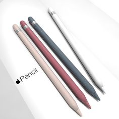 three pens sitting next to each other on top of a piece of paper with the word pencil written in it