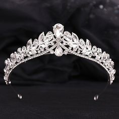 a tiara is shown on a black background