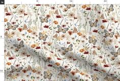 a white fabric with flowers and butterflies on it, as well as measurements for the width