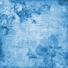 an old paper with blue flowers and butterflies on it's edges is shown in this image