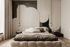 a large bed sitting in the middle of a bedroom next to a tall white wall