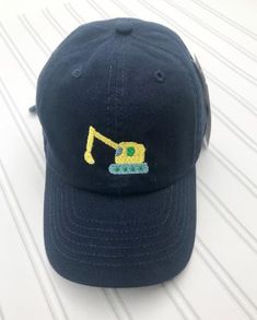 "Personalized Kids or Toddler size baseball hat. The hat is 100% cotton. The hat is a 6 panel, unstructured, low profile style with an adjustable metal ring tuck strap. Comes in TWO sizes: 2-5 Years and 6-9 Years. Please Choose the size upon checkout. MEASUREMENT: 2-5yrs- 3.5\" Crown, 2.5\" Curved seamed bill, 6-9yrs- 4\" Crown, 2 5/8\" curved seamed bill. The hat includes a design on the front of the hat, AND a 3 letter monogram or first name on the back of the hat. The hats can also be customi Toddler Hats Boy, Truck Hat, Mermaid Hat, 3 Letter Monogram, Monogram Hats, Kids Toys For Boys, Kids Hat, Hat Custom, 3 Letter