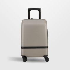 a grey suitcase with black handles and wheels on the front, against a white background