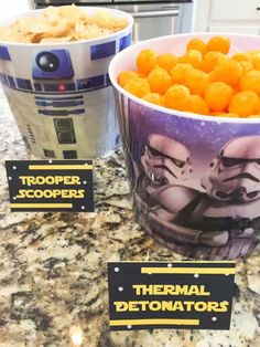 star wars themed popcorn balls in buckets with tags