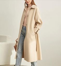 Product Description: This is a handmade cashmere coat high grade fabric,cashmere fabric.also could be custom made with any size and other colors,please feel free to contact with me if you want custom it. Material: wool 80%- 90% Size: S: Bust : 110 cm shoulder:51cm Sleeve:50cm Length:107 cm M: Bust : 114 cm shoulder:52cm Sleeve: 51 cm Length: 107 cm L: Bust : 118 cm shoulder:53cm Sleeve:52 cm Length:107 cm XL: Bust :122 cm shoulder:54cm Sleeve:53 cm Length:107 cm Winter Long Single Breasted Outerwear, Winter Long Single-breasted Outerwear, Single Breasted Long Winter Outerwear, Long Single-breasted Winter Outerwear, Beige Long Single-breasted Outerwear, Beige Wool Coat With Stand Collar For Winter, Beige Long Sleeve Wool Coat For Winter, Long Beige Outerwear For Fall, Winter Wool Coat With Stand Collar, Single Breasted