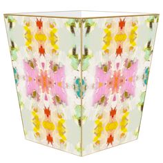 an artisticly designed, multicolored box with flowers on it's sides