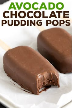 two chocolate pudding pops on a white plate with text overlay that reads, avocado chocolate pudding pops